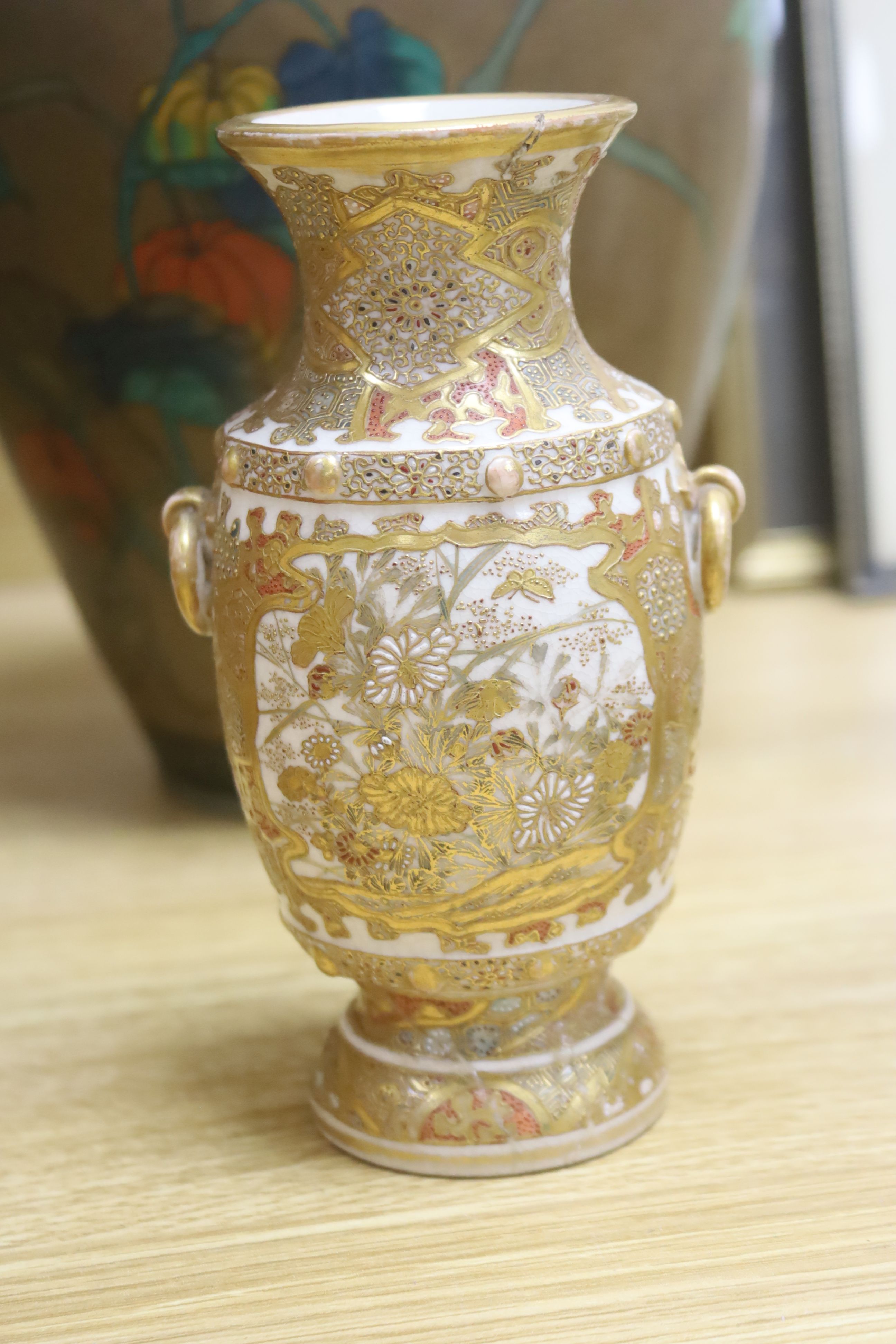 A jar and cover, height 26cm, a Satsuma vase, a cup and saucer and a tile